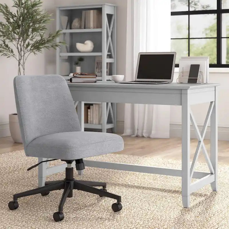 Chaise de bureau sans accoudoirs à dossier mi-haut et roulettes